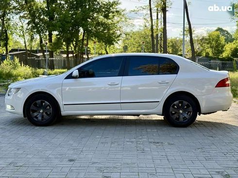 Skoda Superb 2013 - фото 16