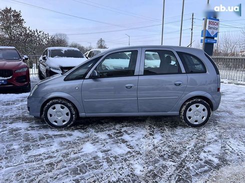 Opel Meriva 2009 - фото 30