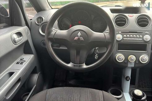 Mitsubishi Colt 2006 - фото 14