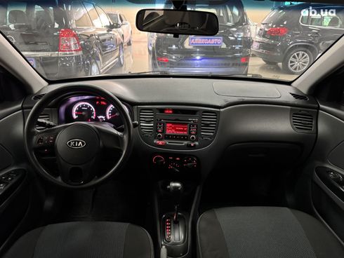 Kia Rio 2010 серебристый - фото 11
