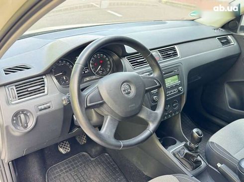 Skoda Rapid 2013 - фото 19
