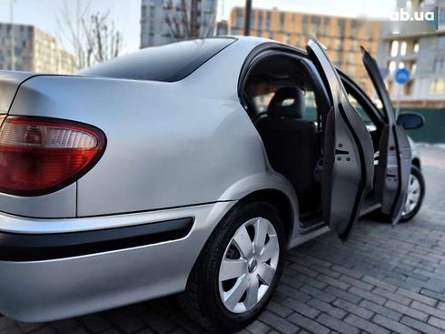 Nissan Almera 2001 - фото 18