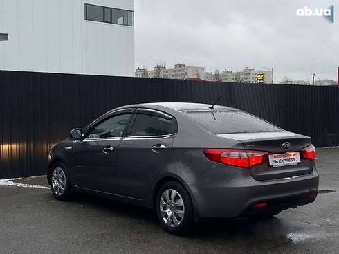 Kia Rio 2013 - фото 7