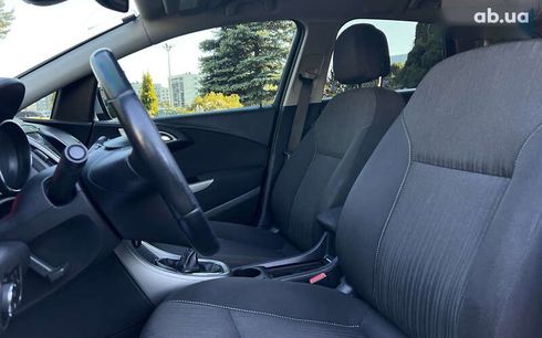 Opel Astra 2011 - фото 15