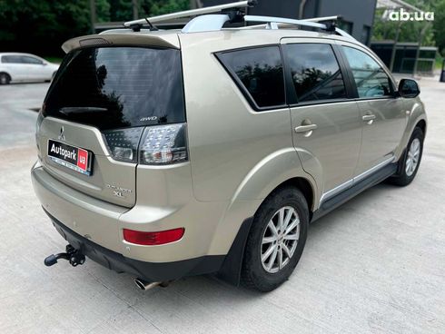 Mitsubishi Outlander XL 2009 бежевый - фото 9