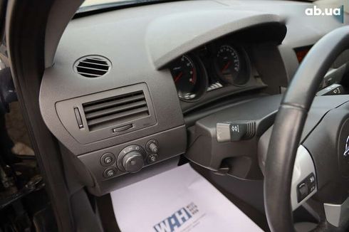 Opel Astra 2013 - фото 11