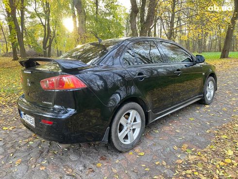 Mitsubishi Lancer 2008 черный - фото 18