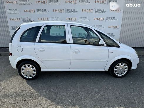 Opel Meriva 2008 - фото 21