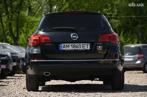 Opel Astra 2014 - фото 8