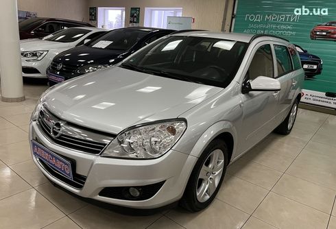 Opel Astra 2008 серебристый - фото 3