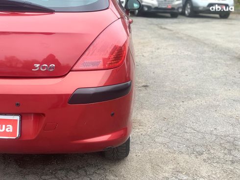 Peugeot 308 2010 красный - фото 11