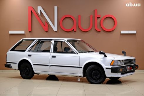 Nissan Bluebird 1987 белый - фото 3