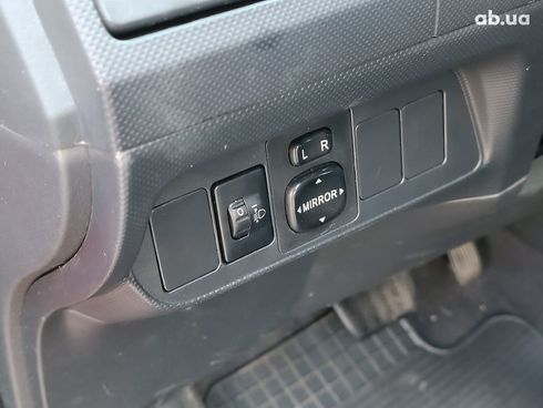 Toyota Auris 2007 красный - фото 22