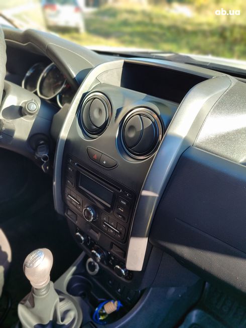 Dacia Duster 2016 белый - фото 16