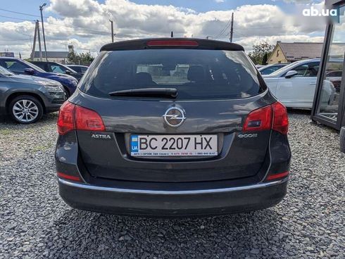 Opel Astra 2014 - фото 6