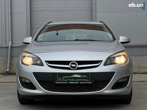 Opel Astra 2012 - фото 2