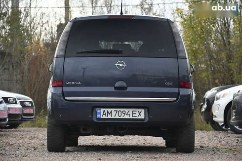 Opel Meriva 2009 - фото 11