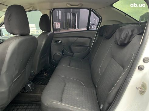 Dacia Logan 2015 белый - фото 11