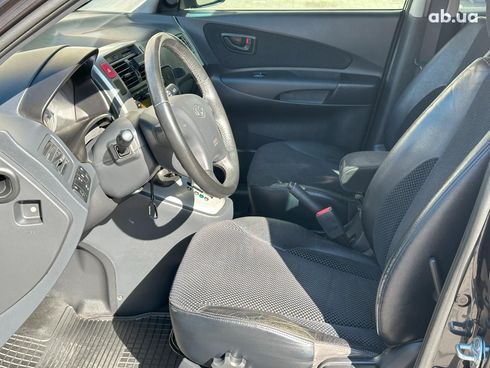 Hyundai Tucson 2011 черный - фото 9