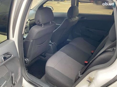 Opel Astra 2012 - фото 11