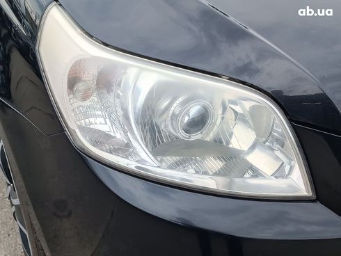 Chevrolet Aveo 2008 черный - фото 4