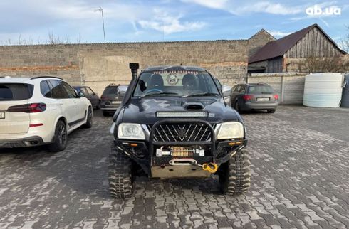 Mitsubishi L200 2005 черный - фото 2