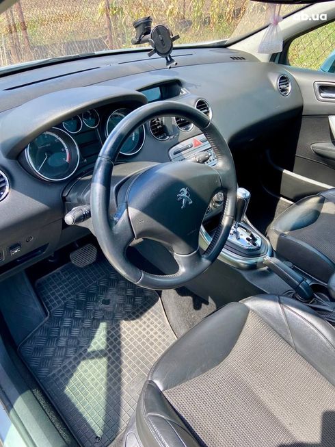 Peugeot 308 2011 серебристый - фото 18