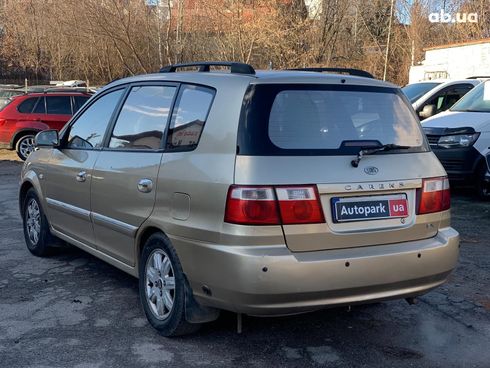 Kia Carens 2003 бежевый - фото 7