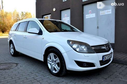 Opel Astra 2010 - фото 13