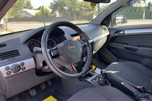 Opel Astra 2010 - фото 12