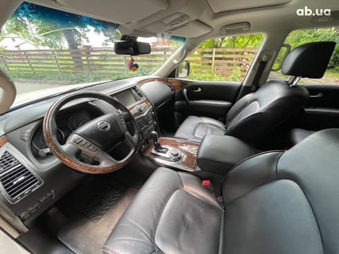 Nissan Patrol 2013 белый - фото 40