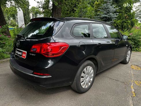 Opel Astra 2012 черный - фото 5