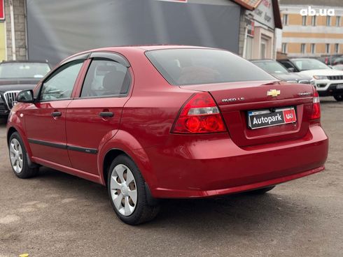 Chevrolet Aveo 2010 красный - фото 9