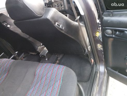 Volkswagen Golf GTI 2004 фиолетовый - фото 10