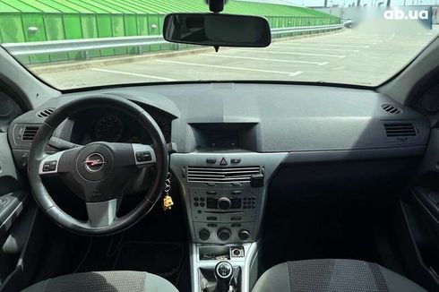Opel Astra 2010 - фото 13