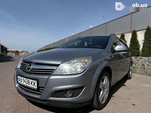 Opel Astra 2009 - фото 11