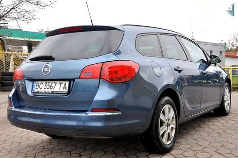 Opel Astra 2013 - фото 8