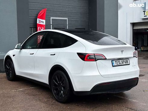 Tesla Model Y 2024 - фото 8