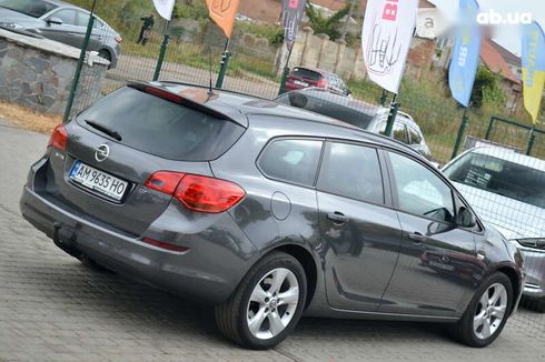 Opel Astra 2011 - фото 14