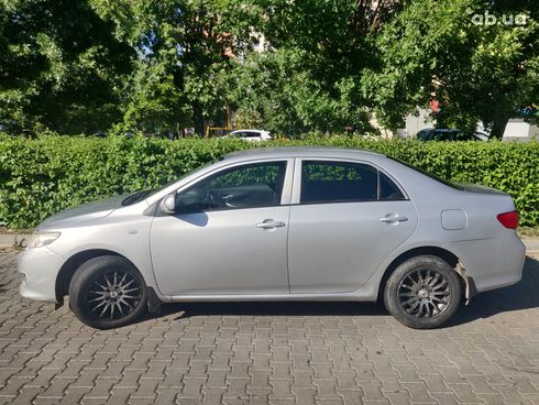 Toyota Corolla 2008 серебристый - фото 16