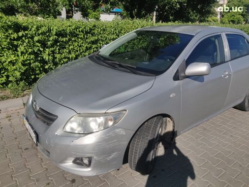 Toyota Corolla 2008 серебристый - фото 13