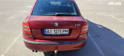 Skoda Octavia 2004 красный - фото 7