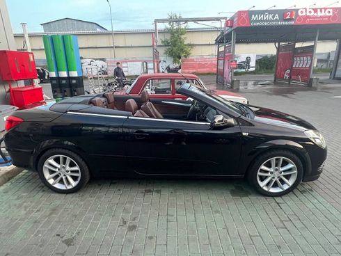 Opel Astra 2007 черный - фото 10