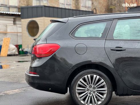 Opel Astra 2013 черный - фото 11