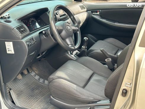 Toyota Corolla 2005 серый - фото 19
