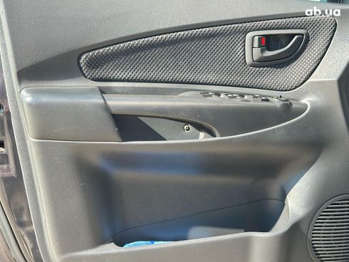 Hyundai Tucson 2011 черный - фото 10