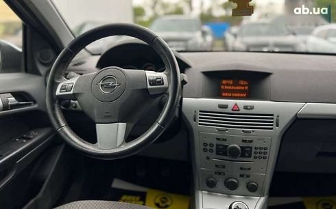 Opel Astra 2009 - фото 14