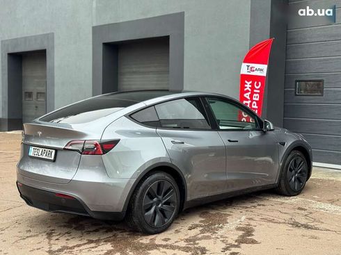 Tesla Model Y 2024 - фото 10