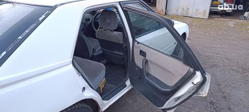 Mazda 323 1990 белый - фото 12