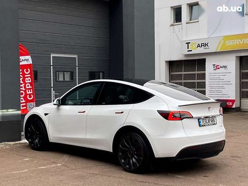Tesla Model Y 2024 - фото 8
